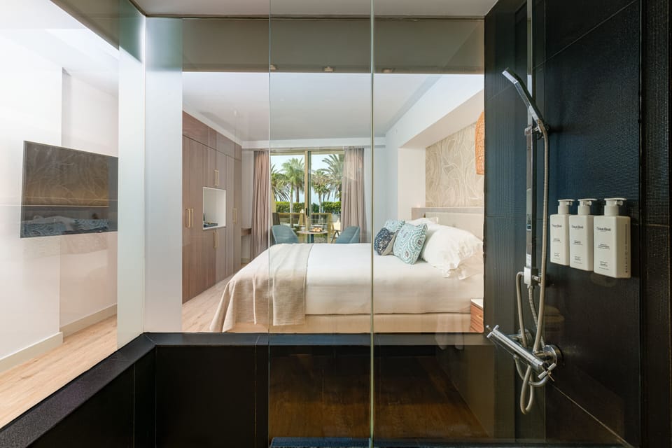 Superior Room, Pool Access, Ground Floor | Bathroom | Separate tub and shower, designer toiletries, hair dryer, bathrobes
