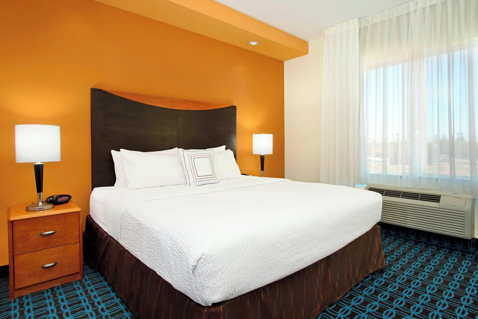 Premium bedding, pillowtop beds, desk, blackout drapes