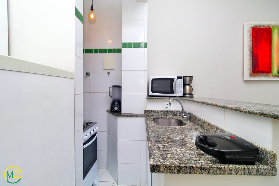 Apartment | Private kitchenette | Fridge, microwave, oven, stovetop