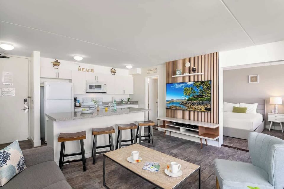 Overview of the living area, dining area, and kitchen
