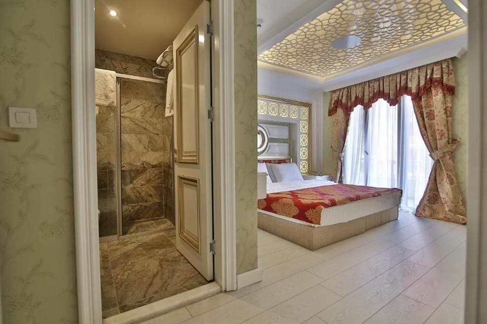 Egyptian cotton sheets, premium bedding, minibar, in-room safe