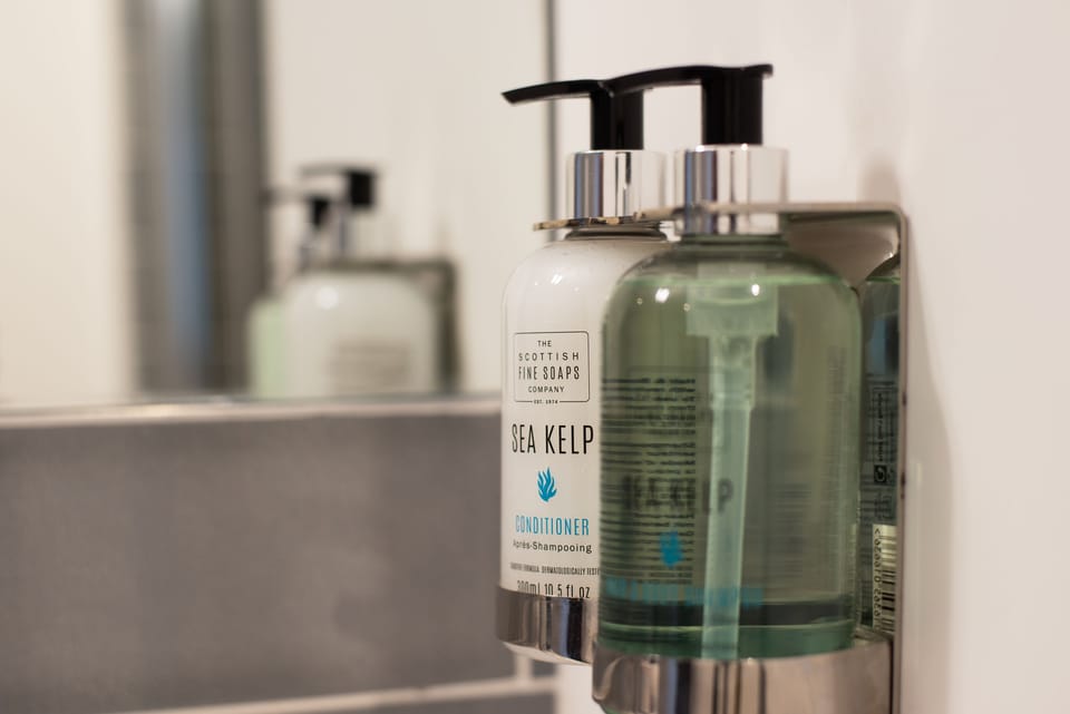 Shower, eco-friendly toiletries, hair dryer, towels