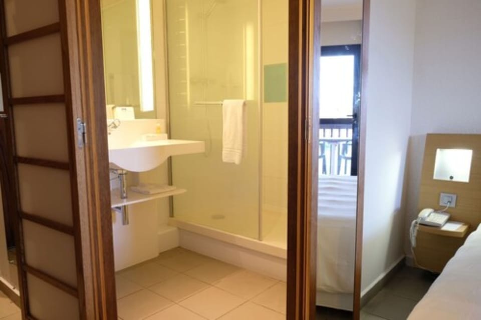 Eco-friendly toiletries, hair dryer, towels