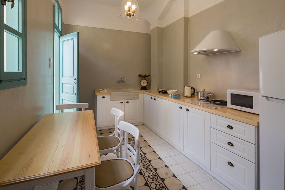 Apartment, 2 Bedrooms | Private kitchen | Fridge, microwave, stovetop, coffee/tea maker