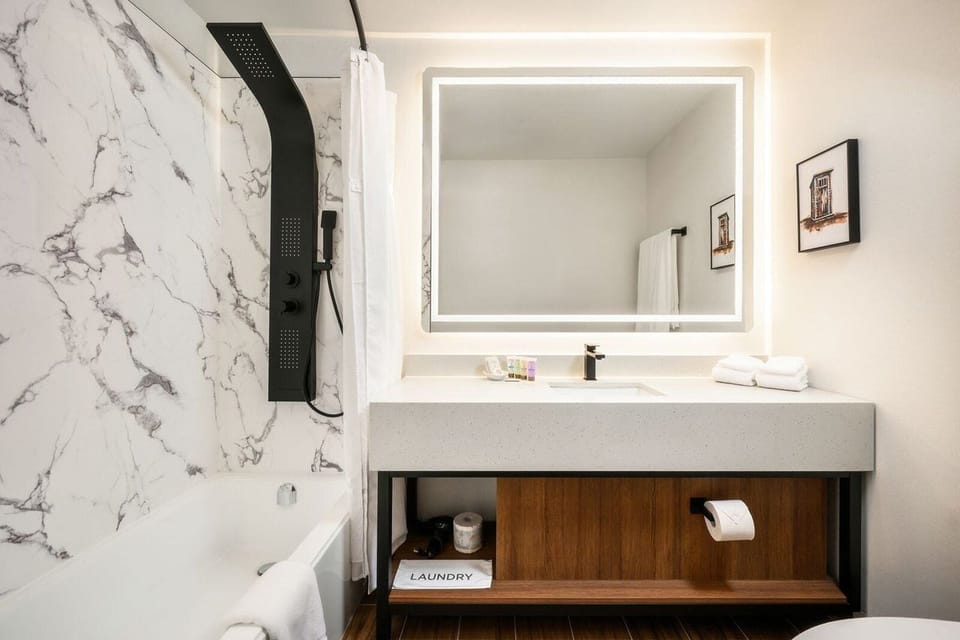 Designer toiletries, hair dryer, bathrobes, towels