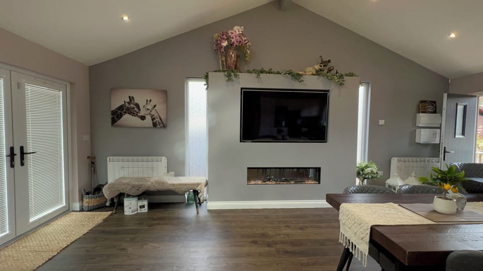 Main living area with view of media wall 