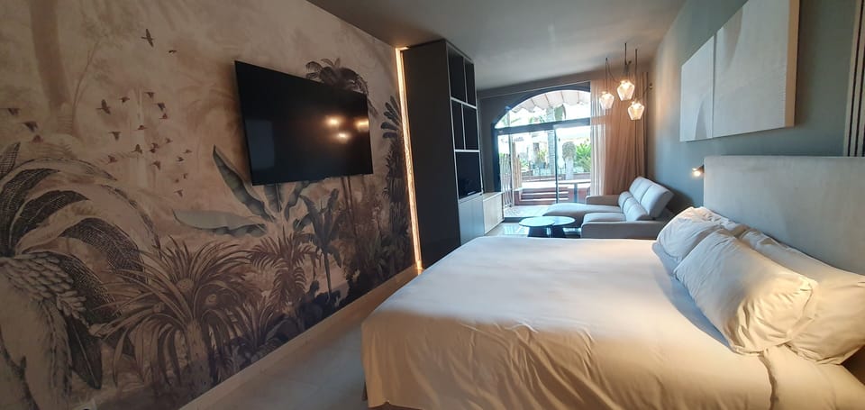 Premium Room, 1 King Bed, Pool Access, Garden Area (Adults Only) | Minibar, in-room safe, individually decorated, individually furnished