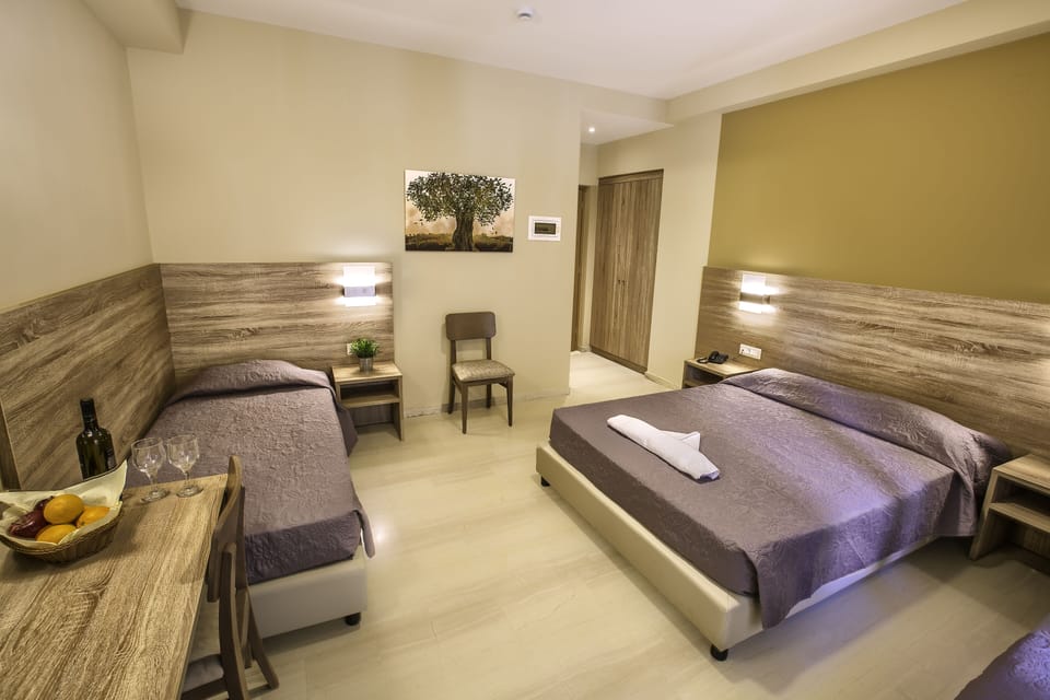 Quadruple Room | Minibar, in-room safe, soundproofing, free cribs/infant beds