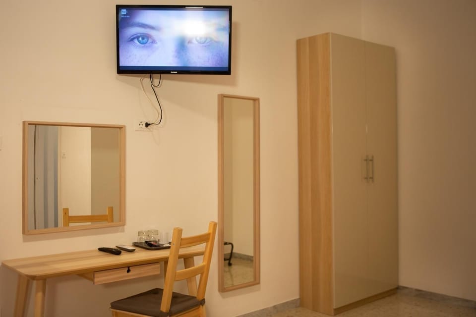 Double Room, City View | Desk, rollaway beds, free WiFi, bed sheets