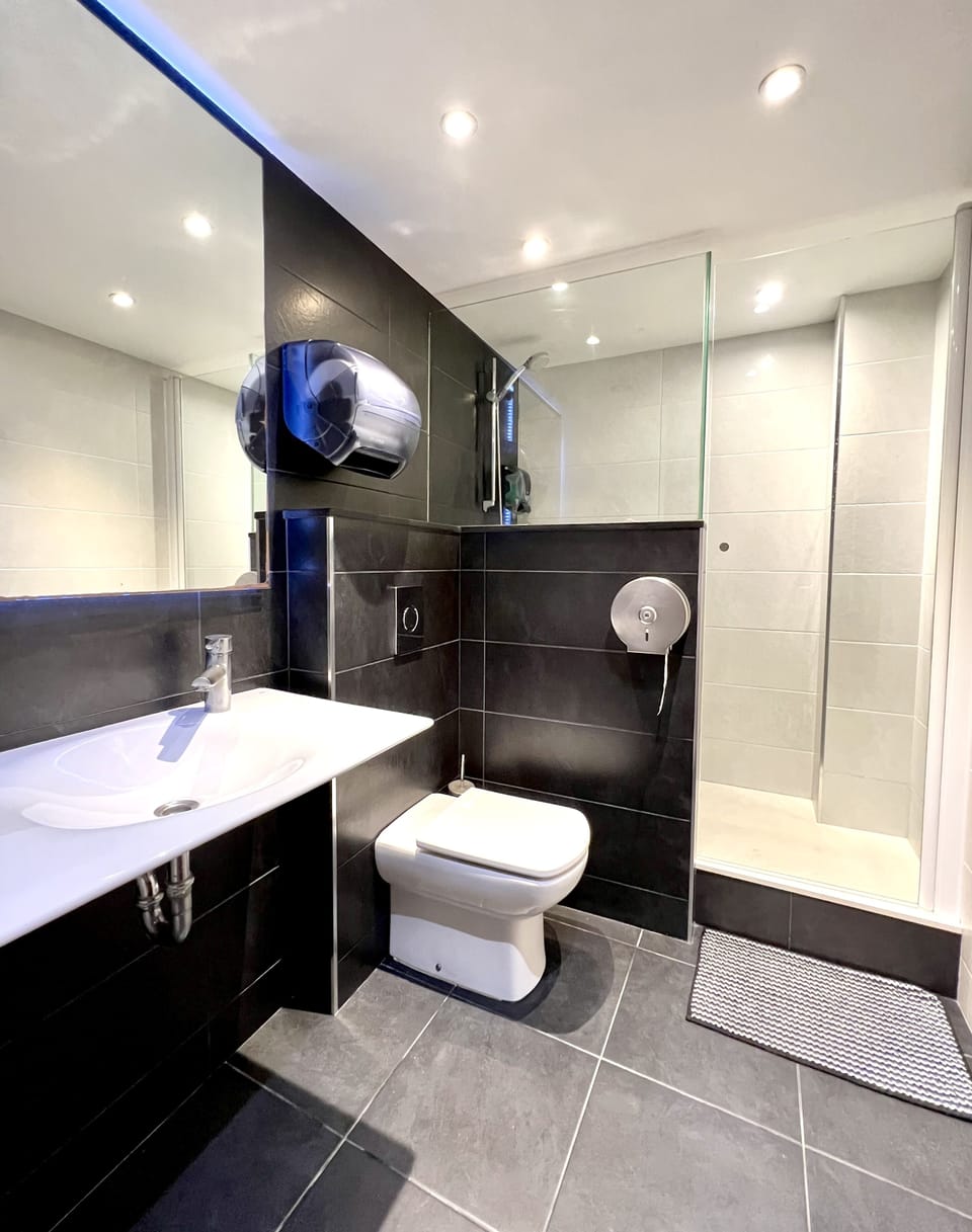 Deep soaking tub, rainfall showerhead, free toiletries, towels