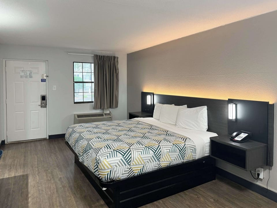 Premium bedding, desk, blackout drapes, iron/ironing board