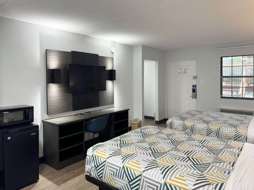 Premium bedding, desk, blackout drapes, iron/ironing board