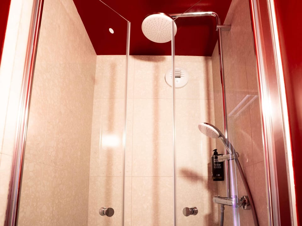 Suite (1 Double Bed and 1 Bunkable Sofa Bed) | Bathroom | Shower, rainfall showerhead, eco-friendly toiletries