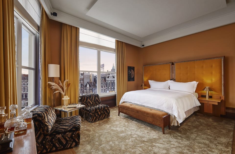 Hypo-allergenic bedding, free minibar items, in-room safe, desk
