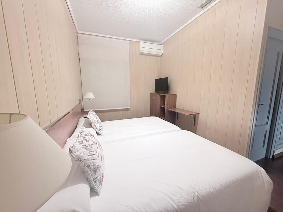 Double Room | Iron/ironing board, cribs (surcharge), WiFi (free), bed sheets