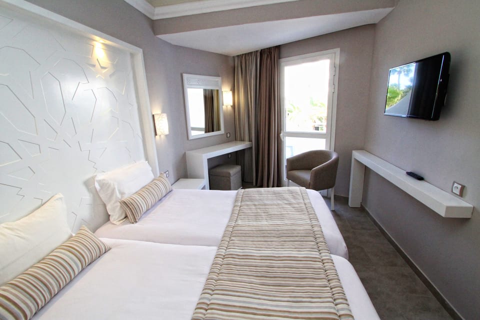 Standard Room | Blackout drapes, free cribs/infant beds, free rollaway beds, free WiFi