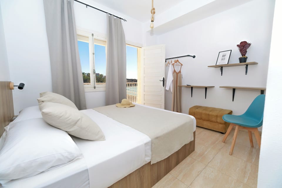 Double Room, Courtyard View | Iron/ironing board, free WiFi, bed sheets