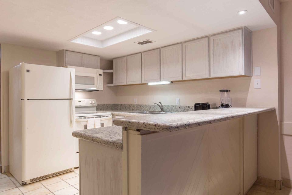 Our dining and kitchen space are joined with a kitchen bar. There is lots of space for preparing snacks and entertaining.