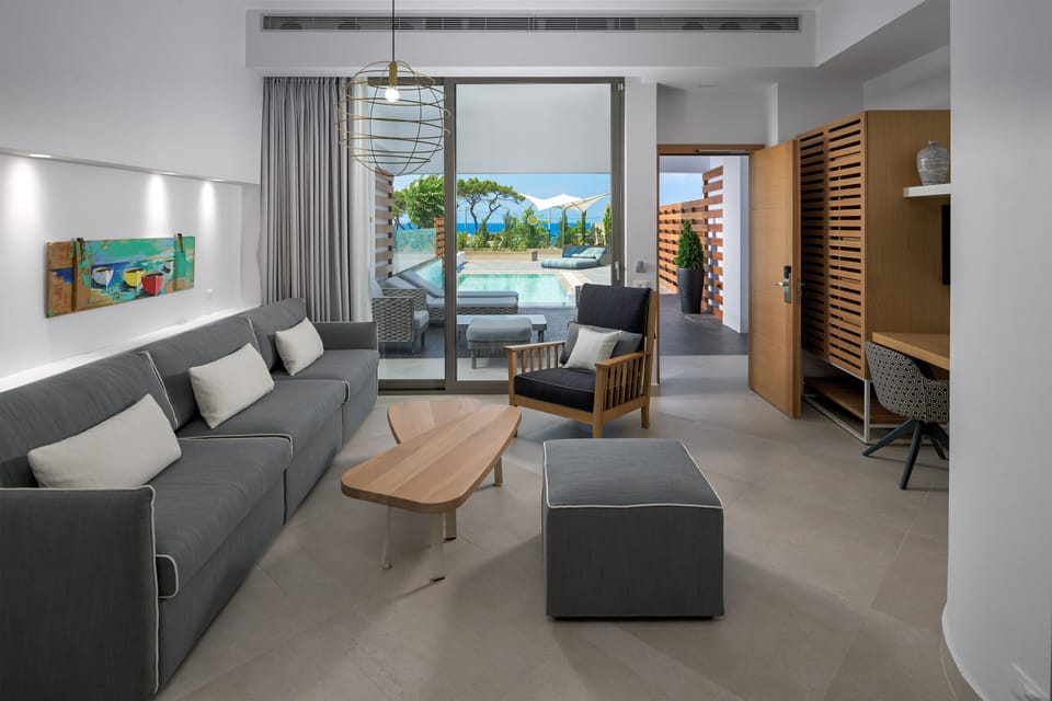Superior Suite, Heated Private Pool (Adults Only) | Living room | Table tennis, books