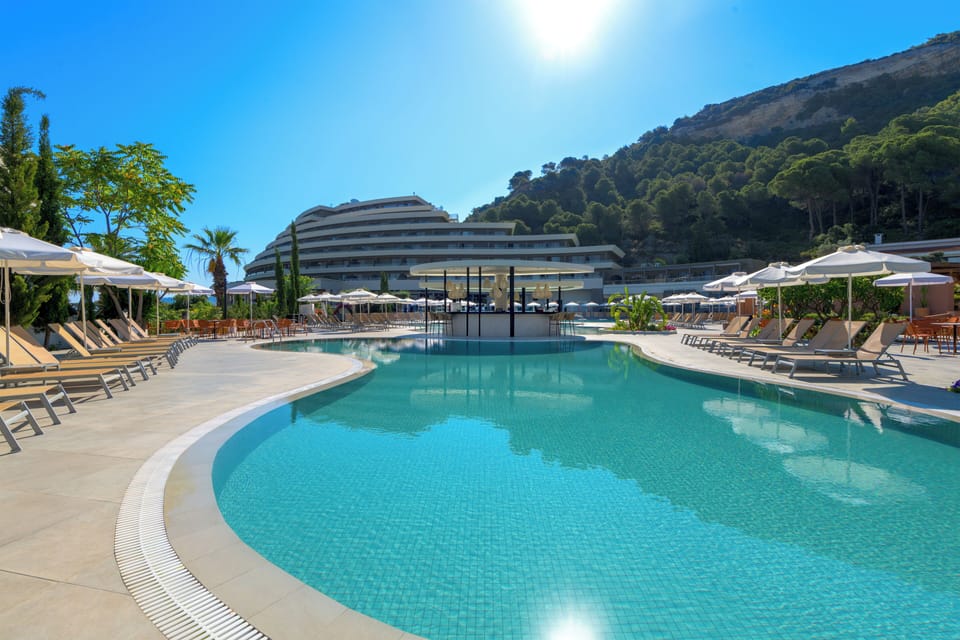 Indoor pool, 3 outdoor pools, open 9:00 AM to 6:00 PM, pool umbrellas