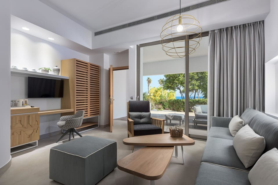 Superior Suite, Heated Private Pool (Adults Only) | Living area | Table tennis, books