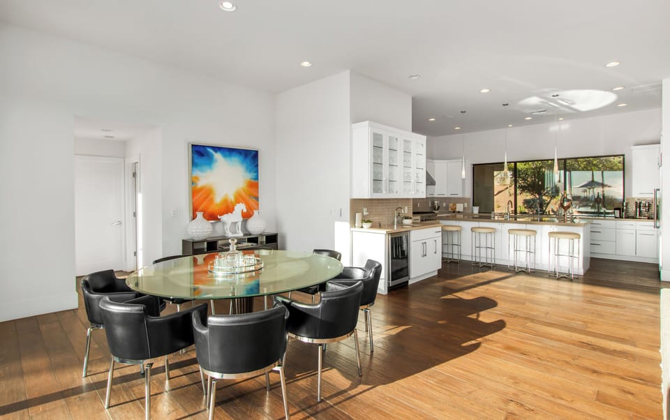 Modern elegance meets comfort! This open-concept kitchen and dining area is perfect for gathering, entertaining, and creating unforgettable moments. Cook, dine, and unwind in style!