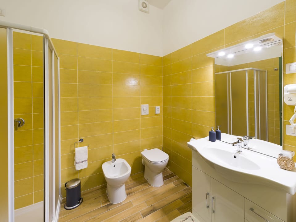 Triple Room, Terrace | Bathroom | Shower, free toiletries, bathrobes, towels
