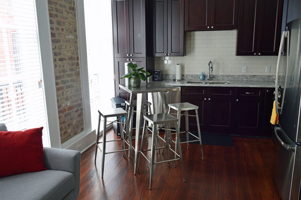Bistro table and stools for the dining area