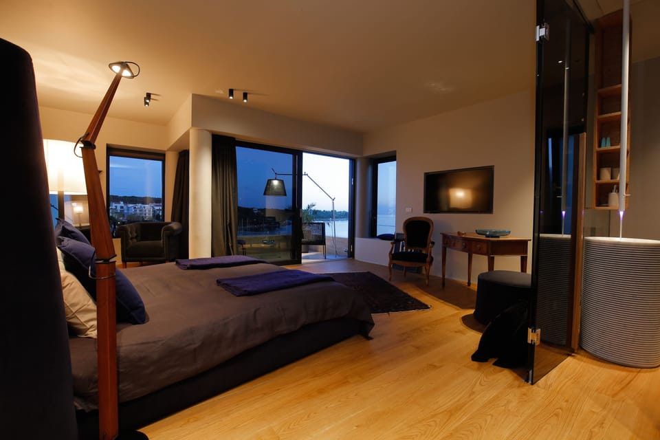 Premium bedding, down comforters, memory foam beds, minibar