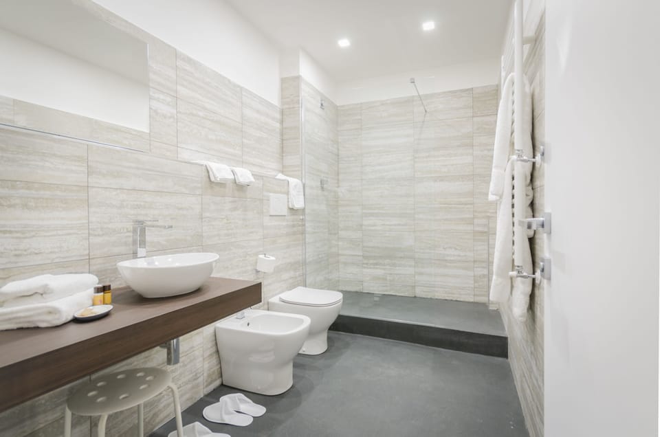 Suite, 2 Bedrooms | Bathroom | Free toiletries, hair dryer, slippers, bidet