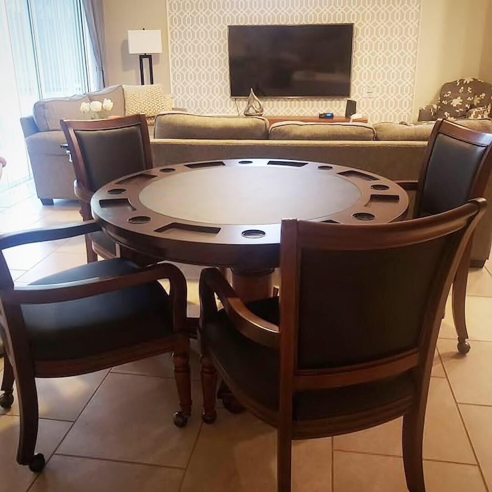 Poker table in Family Room, next to 70 'TV.