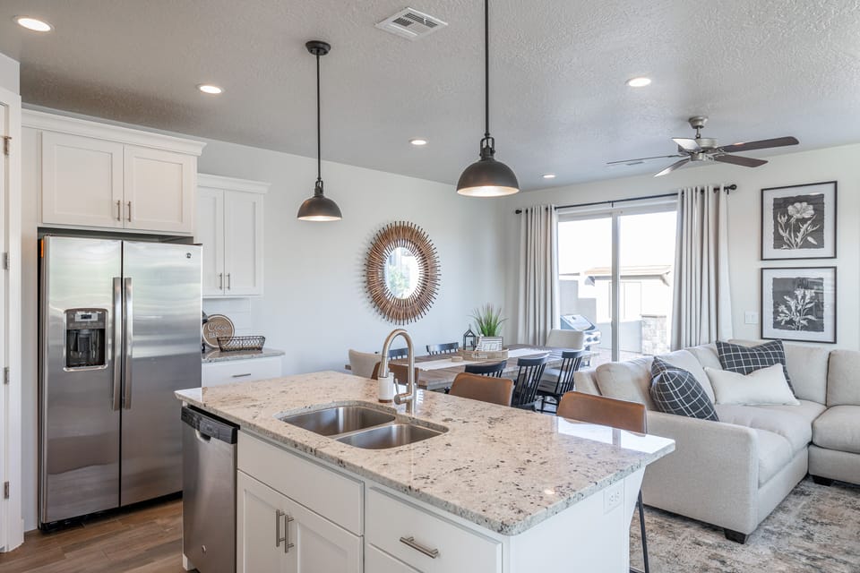 Kitchen Island View - With an open and spacious floor plan, the Dining Room and Kitchen can accommodate meal preparations for groups large or small.