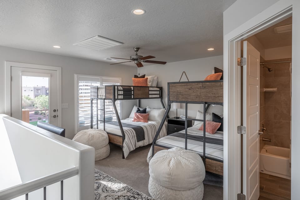 Upstairs Loft - The upstairs loft has two twin over full beds with access to the front patio area.