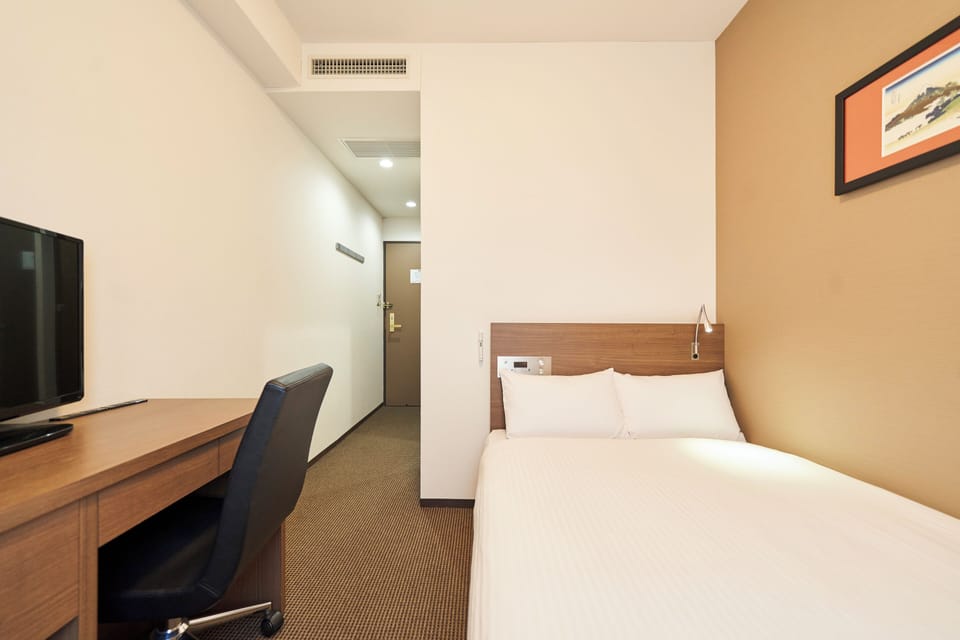 Desk, blackout drapes, iron/ironing board, free WiFi