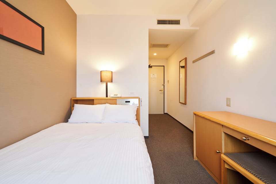 Desk, blackout drapes, iron/ironing board, free WiFi