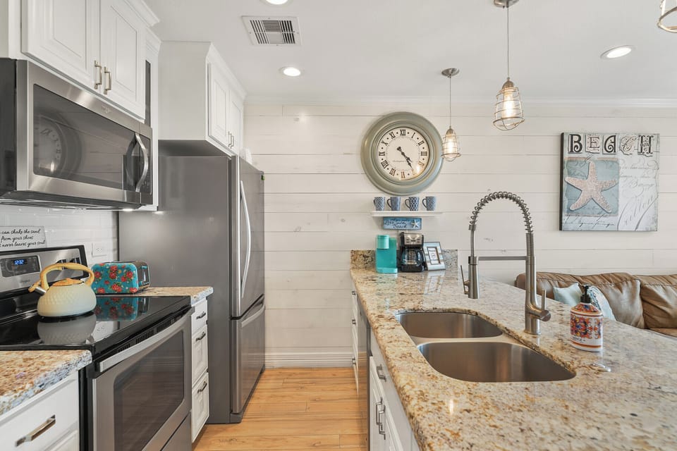 New full size stainless appliances and granite countertops.
