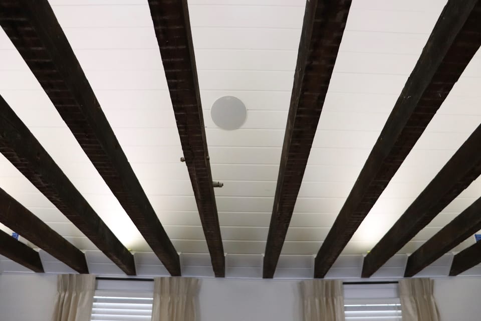 cathedral ceiling with original beams 