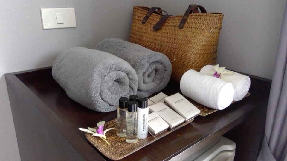 Shower, free toiletries, hair dryer, slippers