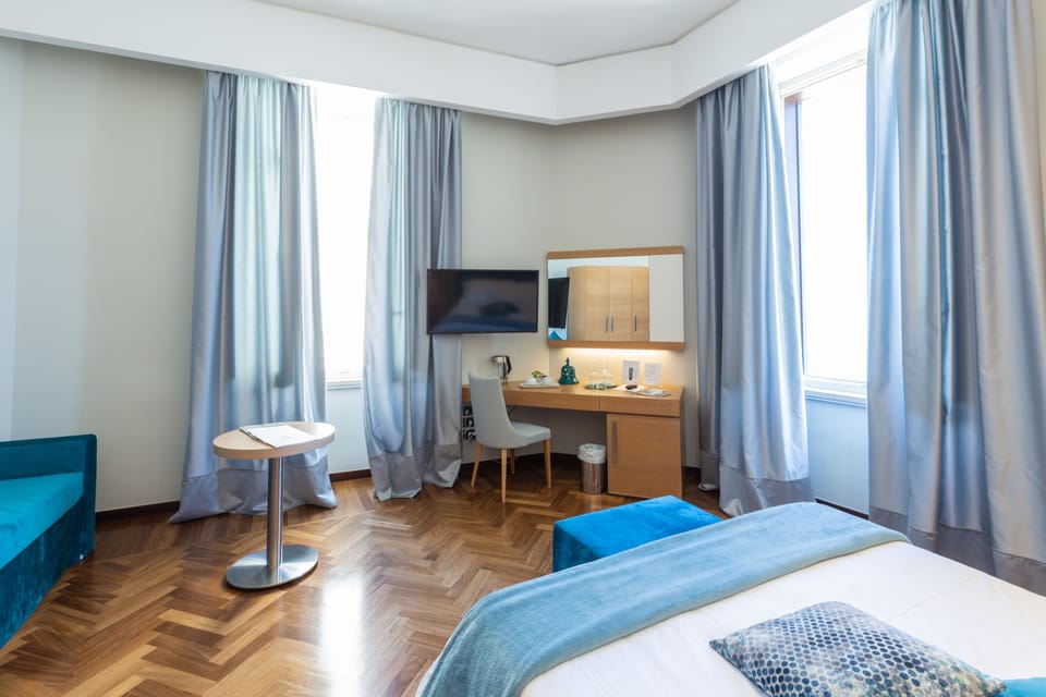 Junior Suite | 1 bedroom, premium bedding, minibar, in-room safe