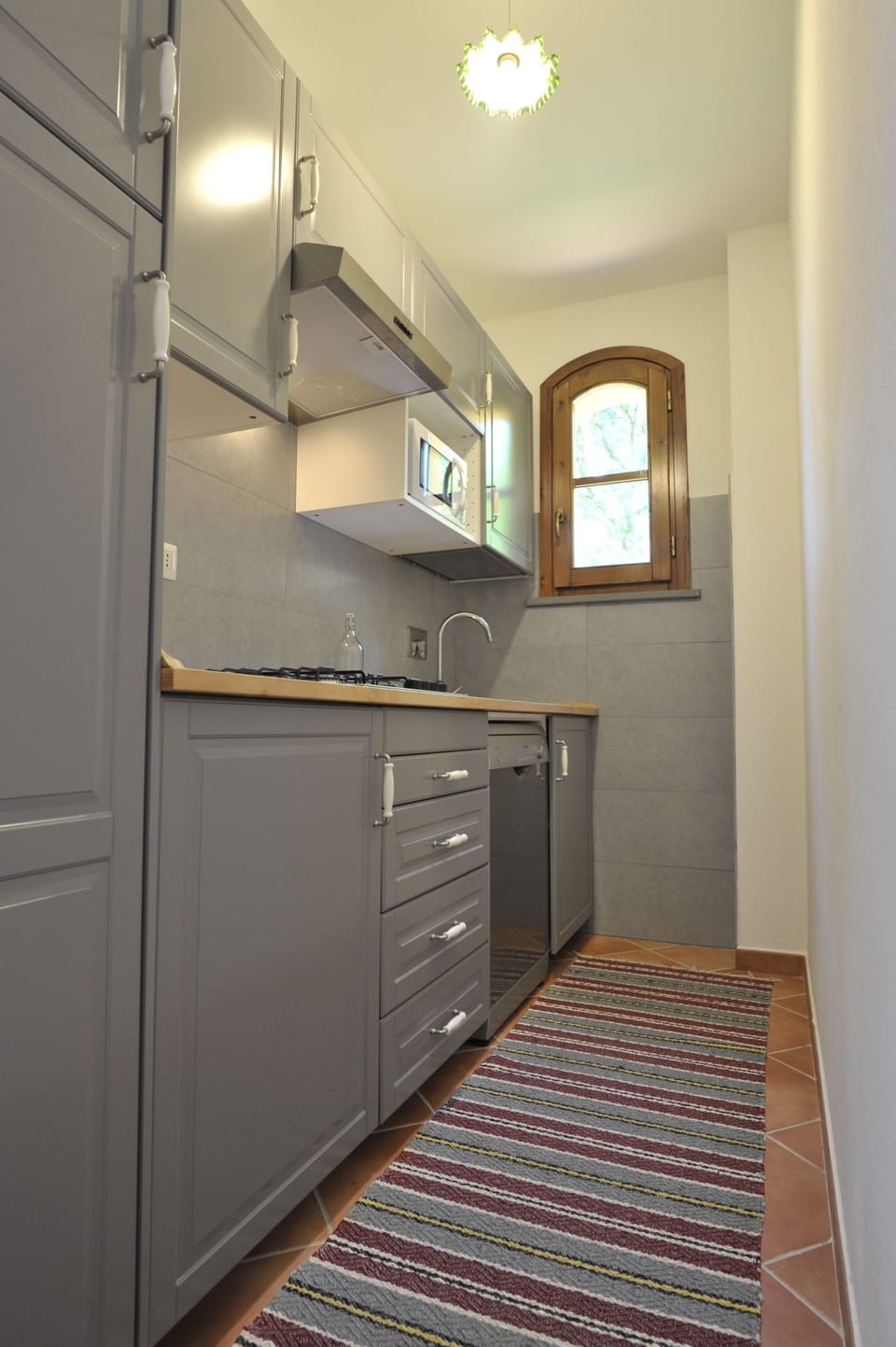 Basic Apartment, Balcony | Private kitchen | Full-size fridge, stovetop, coffee/tea maker, electric kettle