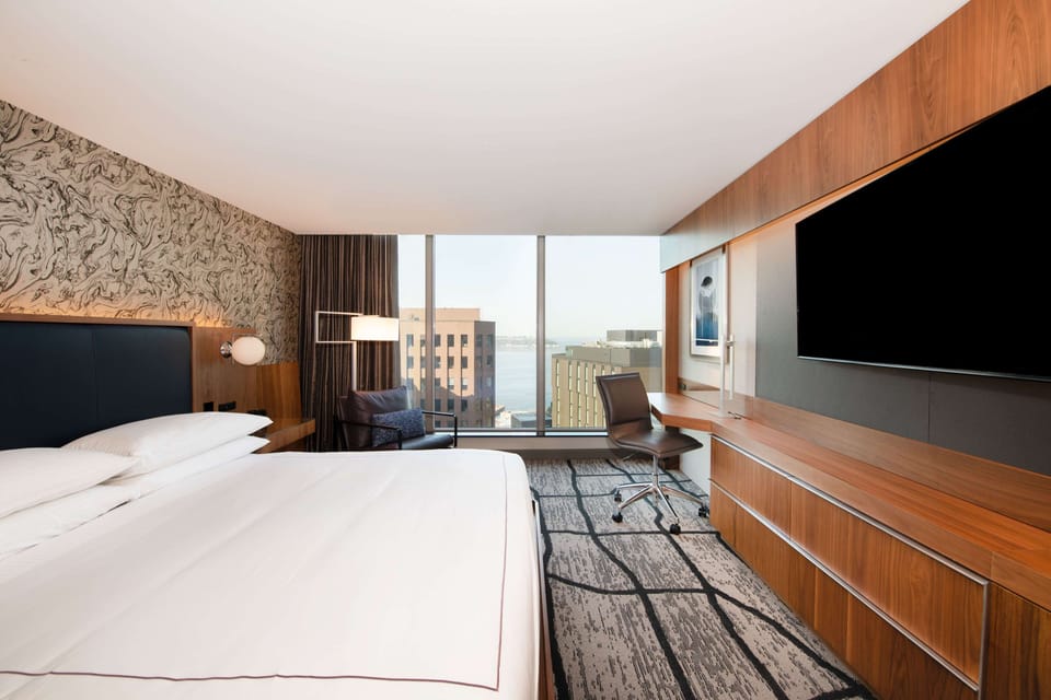 Premium bedding, down comforters, in-room safe, desk