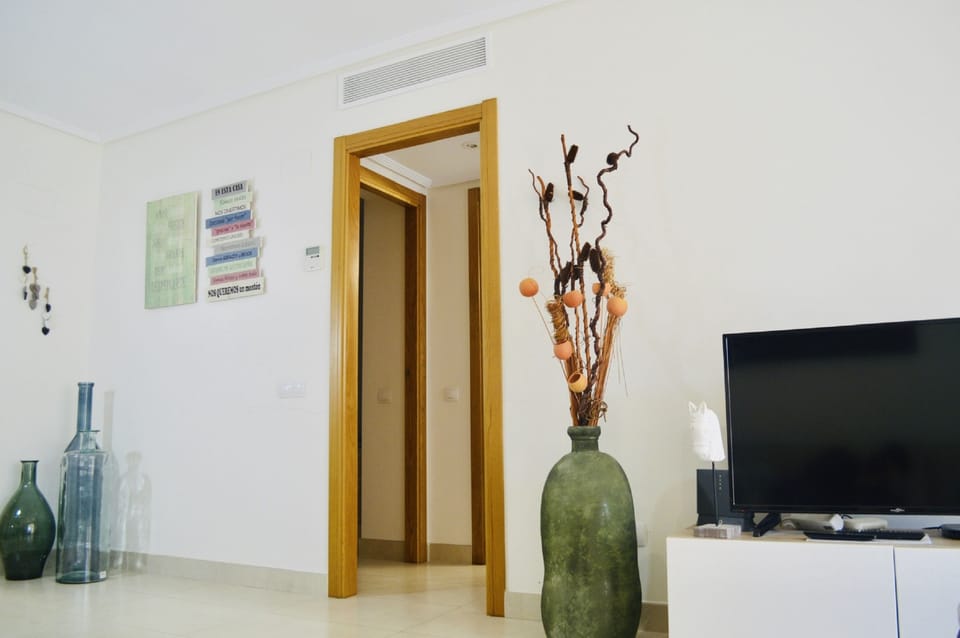 Apartment, 2 Bedrooms, Terrace, Partial Ocean View | Living area | Flat-screen TV