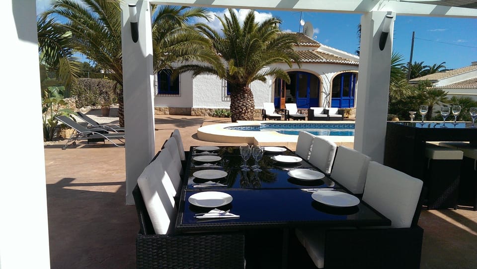 Shaded Poolside Dining Area