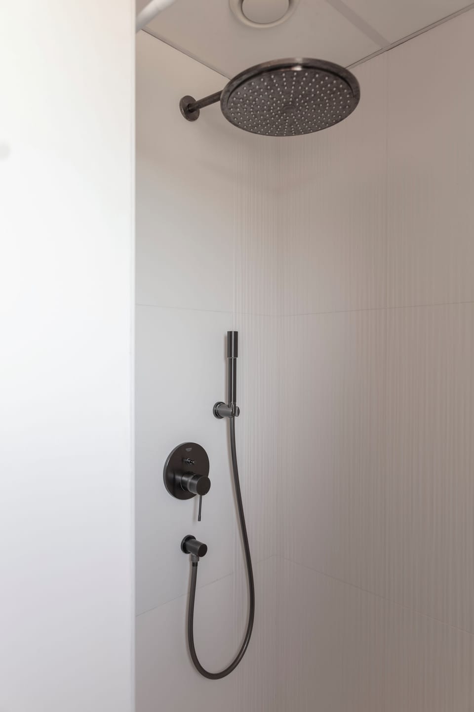 Twin Room | Bathroom | Shower, rainfall showerhead, hair dryer, towels