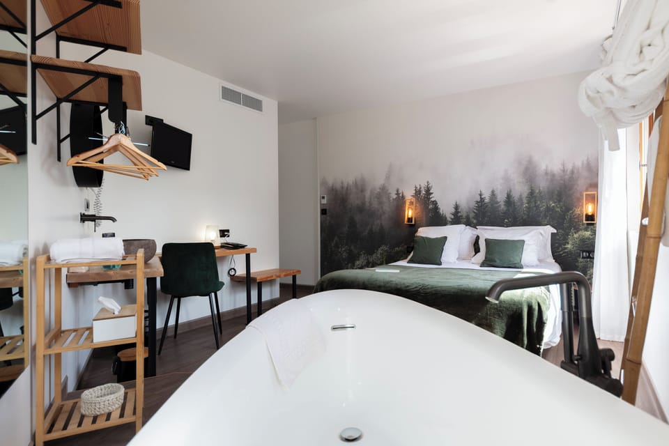 Superior Double Room (Cocoon) | Bathroom | Shower, rainfall showerhead, hair dryer, towels