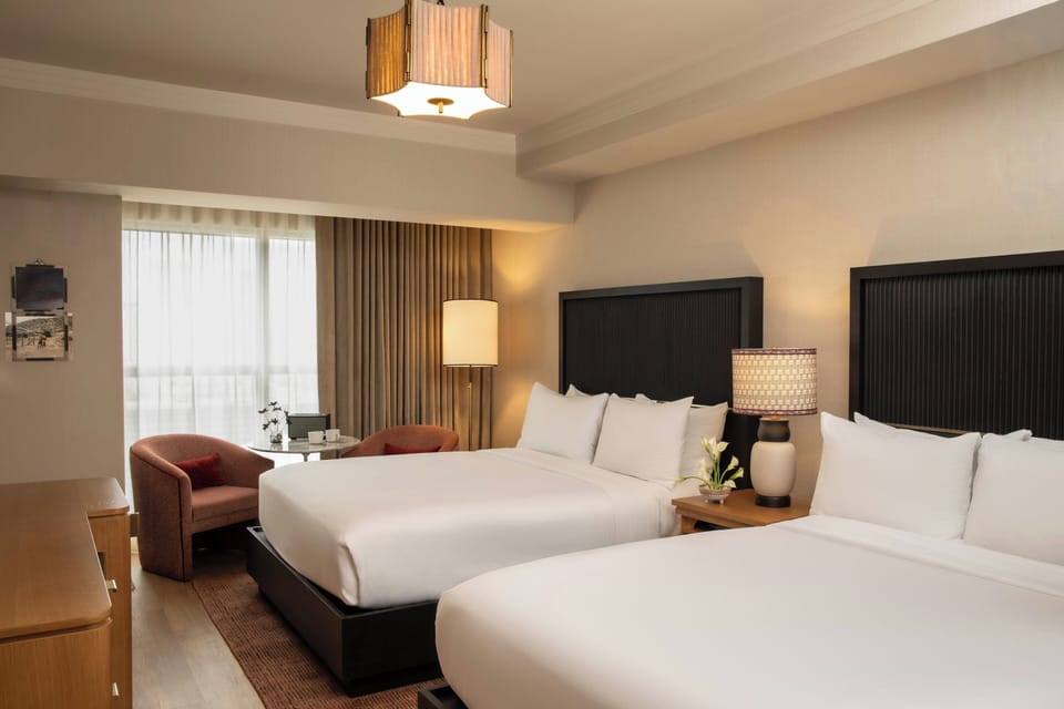 Premium bedding, down comforters, minibar, in-room safe