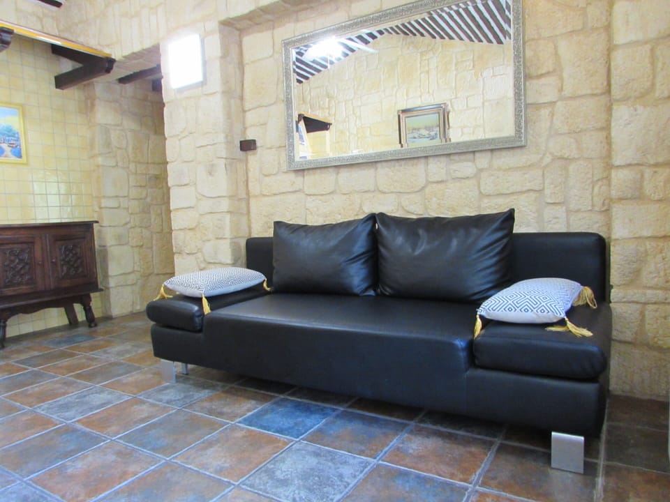 Comfort Cottage, 1 Bedroom | Living area | 82-cm flat-screen TV with digital channels, TV