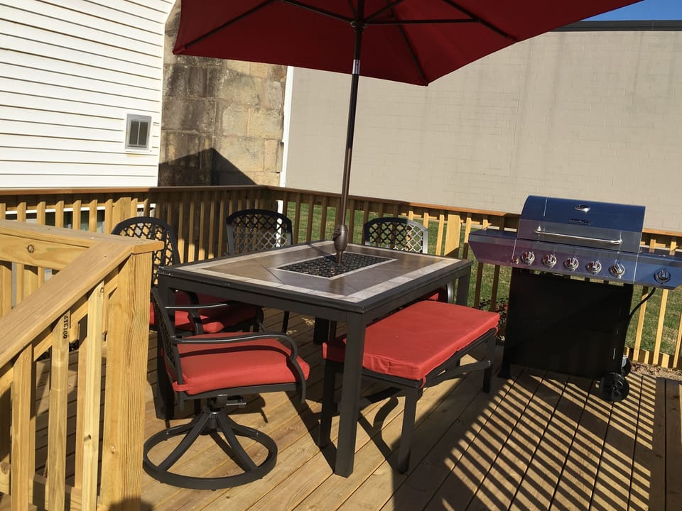 New outdoor deck with gas grill and patio seating for 6.