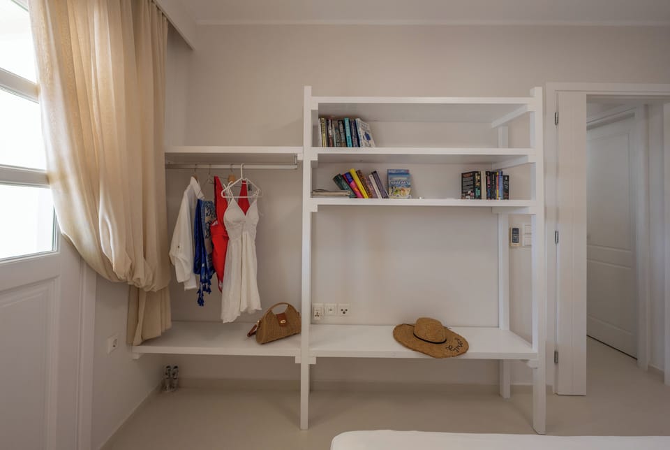 Villa, 4 Bedrooms, Sea View | 3 bedrooms, laptop workspace, iron/ironing board, free cribs/infant beds