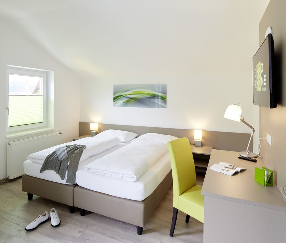 Premium bedding, desk, laptop workspace, WiFi (free)